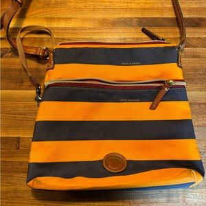 Dooney and Bourke navy and gold striped purse